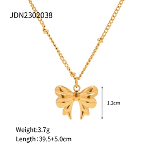 Detail view of 18k gold plated butterfly necklace with chain length and weight specs