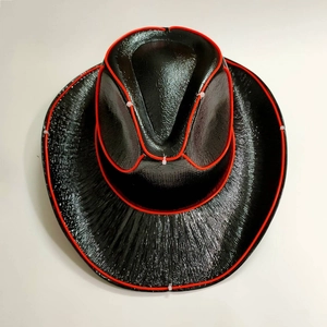 Detail of black cowboy hat with red LED neon wire edges for Halloween parties