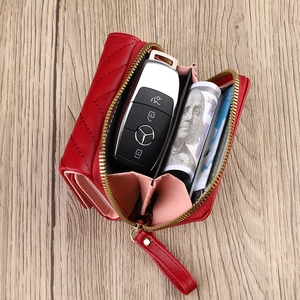 Red quilted leather wallet with gold zipper and three-layer accordion interior compartments