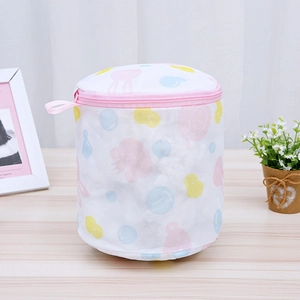 Detail of cylindrical mesh laundry bag for underwear with colorful jellyfish pattern