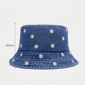 Women's dark blue denim sun hat with white daisy embroidery and 15cm deep bowl shape