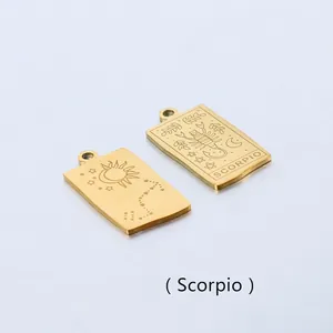 Detail of gold rectangular Scorpio zodiac pendant set with sun and moon engravings
