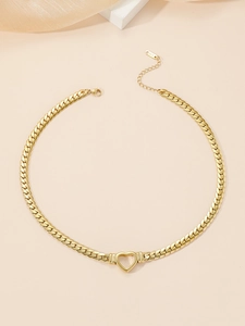 Flat lay of a gold snake chain necklace featuring an elegant hollow heart pendant with k18 stamp