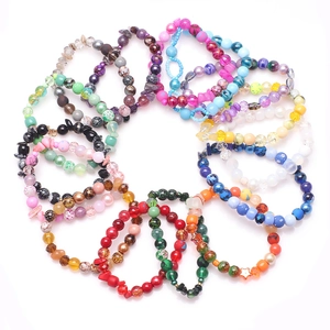 DIY jewelry kit with colorful gradient glass beads and multi-material handmade bracelets