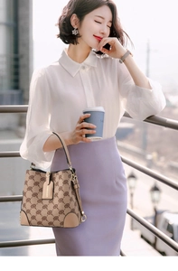 Khaki crossbody handbag with geometric prints styled for urban office fashion look