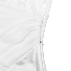Detailed close-up of invisible side zipper and elegant waist pleats on white satin dress