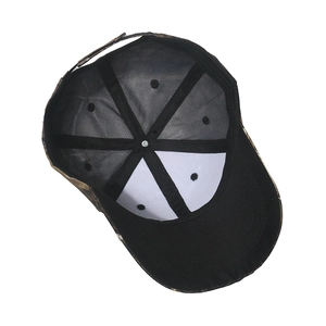 Detail view of camouflage baseball cap interior with breathable mesh and adjustable strap