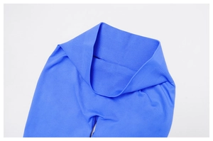 Detail of high waisted royal blue seamless yoga pants showing ribbed wide waistband fabric