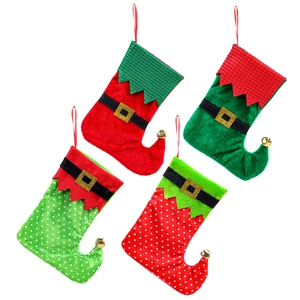 Set of four red and green Christmas elf stockings with gold buckles and bells