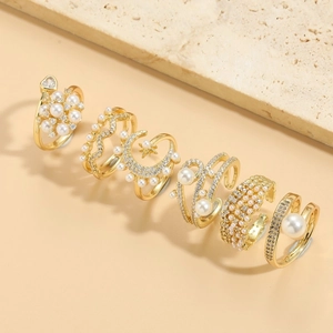 Luxury 6-piece gold ring set featuring pearls, zircons, and celestial moon star designs