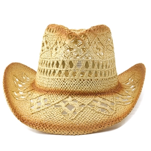 Detail of hollow woven straw cowboy hat showing gradient texture and breathable mesh pattern