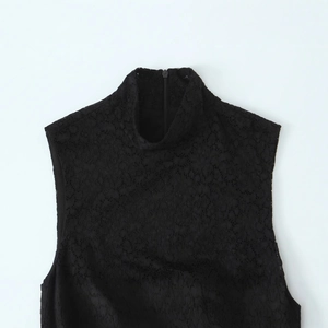 Elegant sleeveless high neck lace mini dress for women in classic black finish