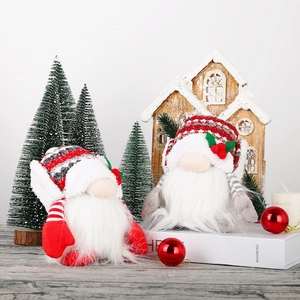 Christmas gnome plush dolls in red and white with glowing Rudolf noses for home decor
