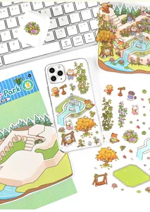 3D PET Park stickers applied to a transparent phone case on a desk with a white keyboard