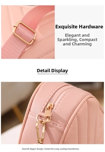 Detail of pink quilted shoulder bag featuring V-shaped stitching and gold metal zipper
