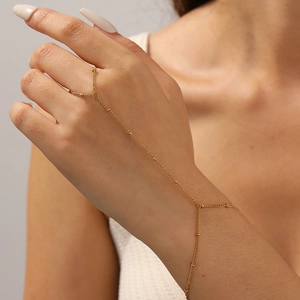 Minimalist gold-plated stainless steel finger bracelet with delicate beads for women