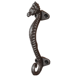 Vintage seahorse cast iron cabinet handle with rustic texture and mounting screws