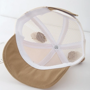Detailed view of the breathable mesh interior and adjustable strap on the baby sun hat