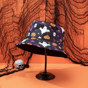 Close-up of Halloween bucket hat with pumpkin and skull prints on a black metal stand