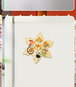 Close-up of rotating snowflake tiger fridge magnet with traditional Chinese lucky charms