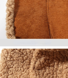 Detail of winter bucket hat featuring ribbed knit fabric and fluffy sherpa texture in brown