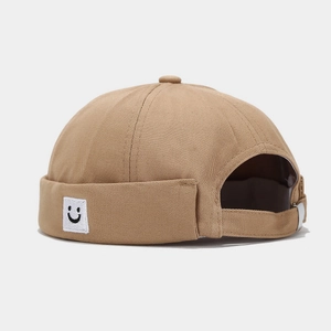 Khaki docker hat with square smile embroidery and adjustable metal buckle strap
