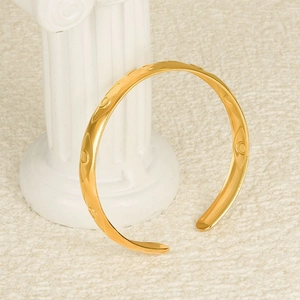 Minimalist 18K gold plated 304 stainless steel Evil Eye bangle with unique round texture