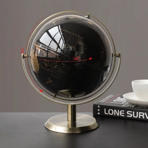 Globe terrestre noir et doré moderne avec support rotatif pour décor de bureau chic