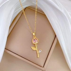 Detailed view of tulip pendant with pink zircon and diamonds in a luxury gift box