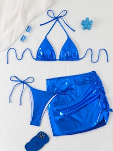 Three-piece metallic blue bikini set with skirt and side-tie details for women