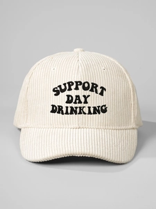 Close-up of Support Day Drinking embroidery on a vintage beige corduroy baseball cap