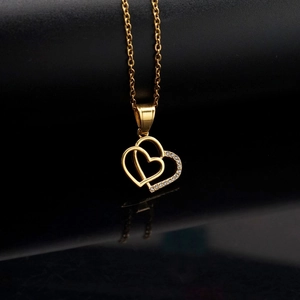 Polished 18K gold double heart pendant necklace with white zircon accents and chain
