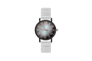 Detail view of quartz watch with white elastic strap and gray gradient dial