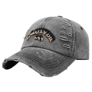 Washed dark gray baseball cap with vintage distressed details and gold embroidery