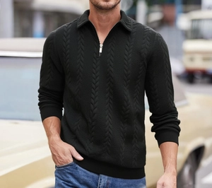Close-up of black men's knit sweater featuring unique leaf cable texture and half-zip collar