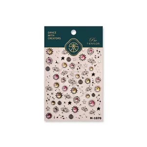 Stickers à ongles célestes M-1070 avec motifs de planètes dorées et galaxie sur fond rose