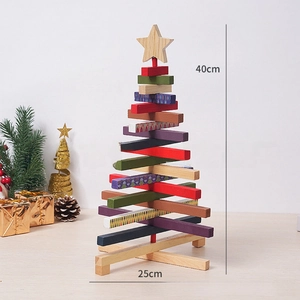 Detail view of colorful wooden rotating Christmas tree showing 40cm height and 25cm width