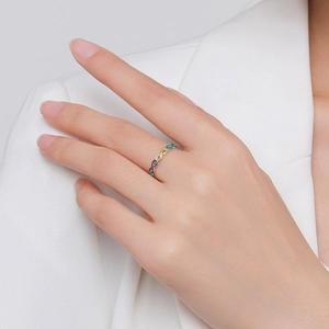 Interlocking silver S925 ring with colorful enamel links in gold, blue, and purple