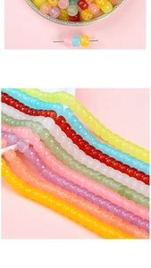 Macro shot of 8x6mm colorful barrel glass beads for handmade jewelry and DIY bracelets