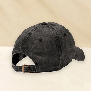 Rear view of washed charcoal cotton baseball cap with adjustable bronze metal buckle
