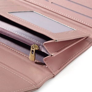 Detail view of pink PU leather wallet showing card slots and golden zipper pocket
