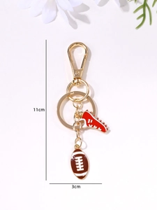 Detailed size view of a gold American football and red sneaker keychain with dimensions