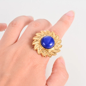 Vintage gold stainless steel flower ring with turquoise and intricate leaf design for women