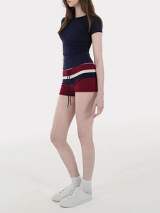 Detailed side view of high-waisted striped knit shorts with adjustable drawstring waist
