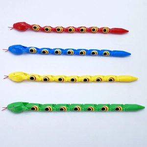 Detailed view of colorful flexible jointed plastic snakes in red blue yellow and green