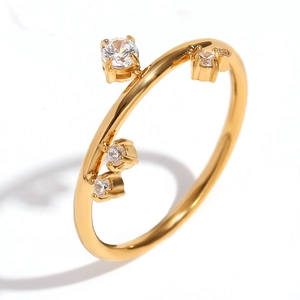 Minimalist 18K gold plated stainless steel crown ring featuring four sparkling white zircons