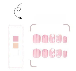 Detail of pink French manicured press-on nails with white floral and vine nail art patterns