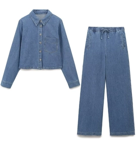 Detailed flat lay of blue denim two-piece set with button shirt and wide-leg drawstring pants