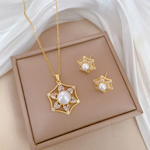 Titanium steel jewelry set with gold hexagonal stars, pearls and sparkling crystals