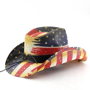 Detail of western straw cowboy hat with vintage American flag pattern and black band
